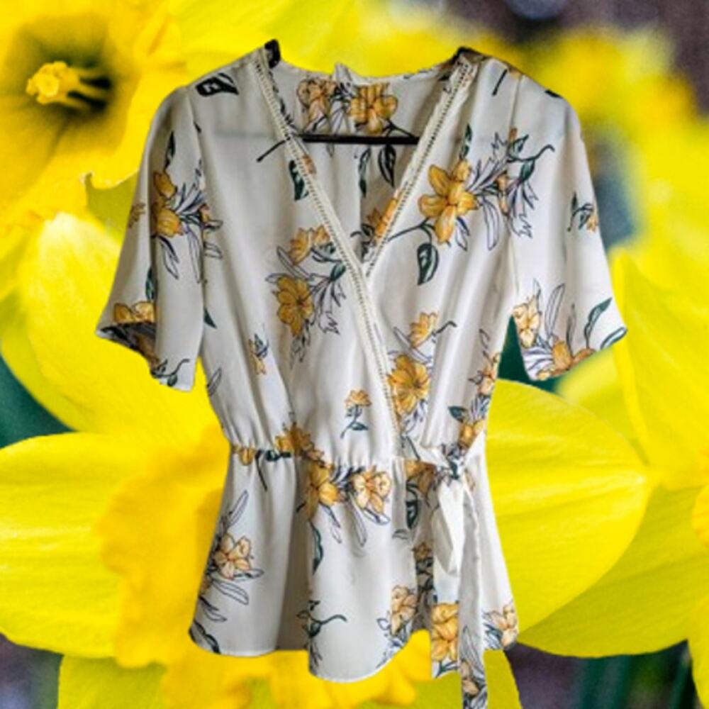 Sienna Sky small short sleeve faux wrap polyester floral print woman's blouse.